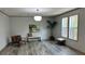 Bright living room with comfortable seating, stylish decor, and plenty of natural light at 10040 Lake Dr, Weeki Wachee, FL 34613
