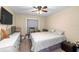 Cozy bedroom with neutral tones, plush carpet, and ample closet space for comfortable living at 10310 Salisbury St, Riverview, FL 33569