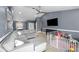 Open concept living room boasts natural light and ample space for relaxation and entertainment at 10310 Salisbury St, Riverview, FL 33569