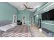 Comfortable main bedroom with recessed lighting, ceiling fan, and ensuite bathroom at 10310 Salisbury St, Riverview, FL 33569