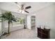 Bright bedroom with large windows and a neutral color scheme at 105 N Comet Ave, Clearwater, FL 33765