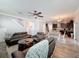 An open floor plan seamlessly integrates the living room with the kitchen and dining areas for easy entertaining at 10560 Lake Seminole Ter, Seminole, FL 33772