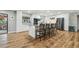 Bright, modern kitchen featuring a central island with barstool seating at 1111 Lakemont Dr, Valrico, FL 33594