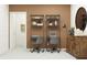 Dedicated home office space with individual workspaces and wooden cabinet at 11118 E 65Th Ter, Palmetto, FL 34221