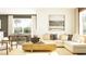 Bright living room with neutral tones, large window, and comfortable seating area at 11118 E 65Th Ter, Palmetto, FL 34221