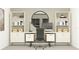 Modern home office featuring built-in shelves, desk, storage, and a round decorative mirror at 11817 Blue Diamond Trl, Parrish, FL 34219