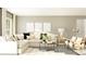 Comfortable living room featuring a sectional sofa, neutral tones, and modern decor at 11817 Blue Diamond Trl, Parrish, FL 34219