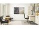 Well-appointed home office with stylish desk, modern furniture and shelving with natural light at 11817 Blue Diamond Trl, Parrish, FL 34219