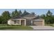Charming single-story home with a two-car garage, beautiful lawn, and manicured landscaping at 11844 Blue Diamond Trl, Parrish, FL 34219