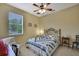 Bright bedroom featuring a ceiling fan at 12012 Cromwell Way, Spring Hill, FL 34609