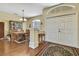 Charming dining room with hardwood floors located off the front entryway at 12012 Cromwell Way, Spring Hill, FL 34609