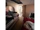 Bedroom area showcasing a dresser, mirror and cluttered personal belongings at 12049 132Nd Ave, Seminole, FL 33778