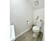 This bathroom has a toilet and a modern sink at 12334 Country White Cir, Tampa, FL 33635