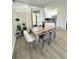 The dining room features modern flooring and is adjacent to the kitchen at 12334 Country White Cir, Tampa, FL 33635