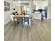 Open-concept dining area with modern decor seamlessly connects to the kitchen at 12334 Country White Cir, Tampa, FL 33635