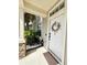 Stylish entryway featuring a charming wreath, offering a warm welcome with its inviting and elegant design at 12334 Country White Cir, Tampa, FL 33635