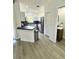 Modern kitchen featuring stainless steel appliances, sleek countertops, and ample cabinet space, perfect for culinary enthusiasts at 12334 Country White Cir, Tampa, FL 33635