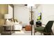 Comfortable living room featuring a neutral sofa, side tables, and stylish decor at 13147 Empress Jewel Trl, Parrish, FL 34219