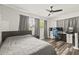 Spacious bedroom with modern furnishings and a large window that fills the room with natural light at 1459 Joel Ln, Clearwater, FL 33755