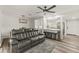 Open concept living room featuring modern furniture and seamless integration with the kitchen at 1459 Joel Ln, Clearwater, FL 33755