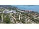 Aerial view of neighborhood and location of home, close to water and bay at 1516 Santa Anna Dr, Dunedin, FL 34698