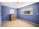 Bedroom with a window, ceiling fan and a dresser at 1516 Santa Anna Dr, Dunedin, FL 34698