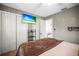 Bedroom with a flat screen tv, closet, and decor at 1516 Santa Anna Dr, Dunedin, FL 34698