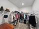 Spacious walk-in closet with ample storage and organizational features at 16913 Anchor Root St, Wimauma, FL 33598