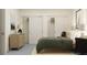 Bedroom with twin closets, neutral tones, simple decor, and natural light from a window at 18136 Serene Lake Loop, Lutz, FL 33548
