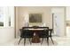 Dining room featuring a modern table with chairs, a stylish buffet, and large window at 18136 Serene Lake Loop, Lutz, FL 33548