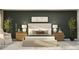 Serene main bedroom with a king-sized bed, nightstands, lamps, and an armchair at 18136 Serene Lake Loop, Lutz, FL 33548