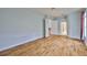 Large bedroom with hardwood flooring and an ensuite bathroom and walk-in closet at 18444 Eastwyck Dr, Tampa, FL 33647