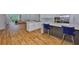 Open-concept kitchen featuring a spacious island with seating, stainless appliances, and modern countertops at 18444 Eastwyck Dr, Tampa, FL 33647