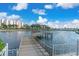 Waterfront condo complex with fishing dock, lake views and tropical landscaping at 19029 Us Highway 19 N # 5-16, Clearwater, FL 33764