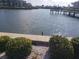 Peaceful waterfront scenery with calming water views and greenery, highlighting community features at 19029 Us Highway 19 N # 5-16, Clearwater, FL 33764