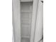 This walk in closet features white wire shelving at 21033 Market St, Dade City, FL 33523
