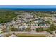A drone shot of a community in Florida near the ocean at 2614 Hawk Roost Ct, Holiday, FL 34691