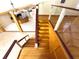 Open view of wood staircase from upstairs at 2614 Hawk Roost Ct, Holiday, FL 34691