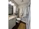 Cozy bathroom features modern fixtures, a shower, and ample storage at 2745 4Th S Ave, St Petersburg, FL 33712