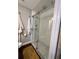 Bathroom boasts a modern sliding glass door shower and marble accents at 2745 4Th S Ave, St Petersburg, FL 33712