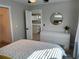 Bedroom showcasing modern dresser and doorway to living space, offering a blend of comfort and style at 2745 4Th S Ave, St Petersburg, FL 33712