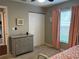A bedroom features soft carpet, a dresser, and a closet at 2745 4Th S Ave, St Petersburg, FL 33712
