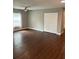 Large, bright bedroom with hardwood floors, a spacious closet, and a neutral color scheme at 2745 4Th S Ave, St Petersburg, FL 33712