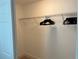 Walk-in closet with hanging racks provides ample storage space, ideal for organization and convenience at 2745 4Th S Ave, St Petersburg, FL 33712