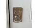 Close up of a Kwikset front door lock with numbered buttons and keyhole at 2745 4Th S Ave, St Petersburg, FL 33712