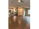 Open concept living space with hardwood flooring, seamlessly connecting the living area and kitchen at 2745 4Th S Ave, St Petersburg, FL 33712
