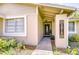 Inviting front entrance with decorative door and well-maintained landscaping at 2818 Cedaridge Dr, Tampa, FL 33618
