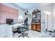 Office space with a desk, chair, a cabinet, and large window creating a productive atmosphere at 2818 Cedaridge Dr, Tampa, FL 33618