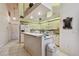 Functional kitchen features ample cabinet space and a convenient breakfast bar at 2901 50Th E Pl, Bradenton, FL 34203