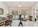 Open living room with tile floors and french doors to the pool area at 2901 50Th E Pl, Bradenton, FL 34203